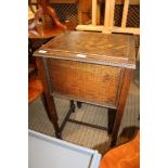 AN OAK FINISHED LIFT UP LID BOX TOP TABLE