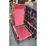 A TURNED WOODEN FRAMED AMERICAN STYLE ROCKING ARMCHAIR with velour upholstered back, seat and arm