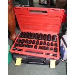 A CASED JIGSAW AND A CASED SOCKET SET