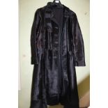A LADIES FULL LENGTH DOUBLE BREASTED PONY SKIN COAT with choker collar