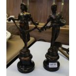 A PAIR OF CAST METAL PROBABLE FRENCH PEASANT FIGURES on turned wooden plinth bases