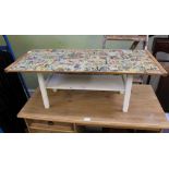 A DECORATED SOFTWOOD RECTANGULAR COFFEE TABLE, having "The Amazing Spiderman" decoupage top, on a