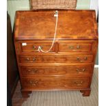 A GOOD QUALITY REPRODUCTION YEW WOOD FINISHED BUREAU, with crossbanded fall down writing slope, over