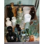 A BOX CONTAINING A SELECTION OF COLLECTOR'S BOTTLES both glass and pottery