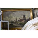 A LARGE OIL ON CANVAS STUDY OF A DUTCH VILLAGE, in modern, aged gilt frame