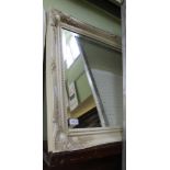 A MODERN IVORY WHITE FINISHED BEADED FRAMED BEVEL PLATE WALL MIRROR