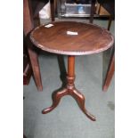 A REPRODUCTION BEAD EDGE CIRCULAR TOPPED WINE TABLE on single column and three downswept legs