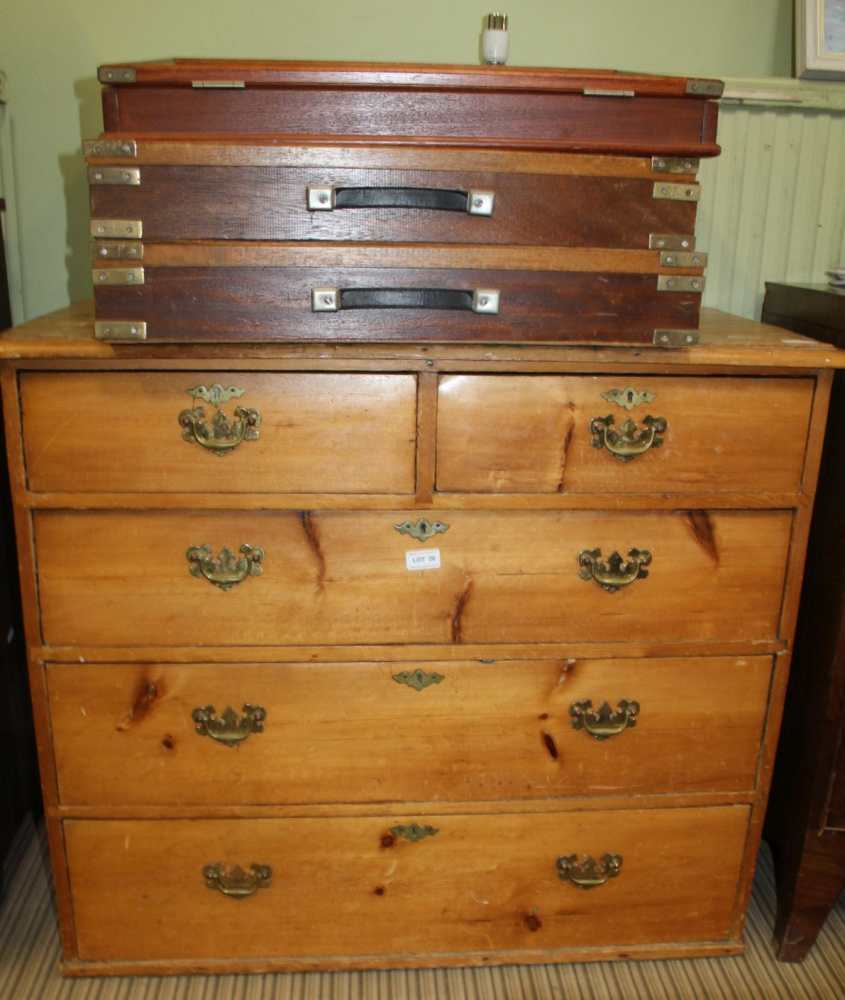 A PINE CHEST OF FIVE DRAWERS having two inline and three graduating full width drawers