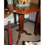 A LATE 19TH CENTURY MAHOGANY HEXAGONAL TOPPED OCCASIONAL TABLE on faceted column and three downswept