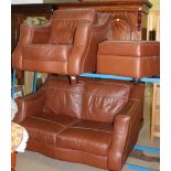 A MODERN CHOCOLATE BROWN LEATHER THREE PIECE SUITE comprising; two person settee, single armchair