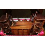 A BOX CONTAINING A SELECTION OF WOODEN DISPLAY STANDS to include Black Forest carved examples