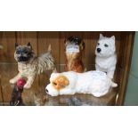 FOUR VARIOUS BESWICK BRANDED DOGS