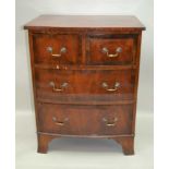 A LATE 19TH CENTURY MAHOGANY BOW FRONTED CHEST OF FOUR DRAWERS, having crossbanded top, over two