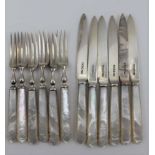 MAPPIN & WEBB A SET OF SILVER DESSERT KNIVES AND FORKS, for six people, with mother of pearl
