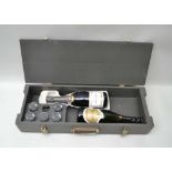 A MILITARY "SHOOTING PARTY" WOODEN CASE containing a bottle of F. Bonnet Brut champagne and a bottle