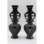 A PAIR OF JAPANESE MEIJI PERIOD BRONZE VASES, the high necks transforming from round at the body