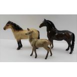A BESWICK "HIGHLAND" HORSE, 18cm high, together with a BESWICK BROWN HORSE and a BESWICK FALLOW DEER