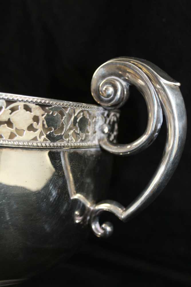 A SILVER PLATED BOWL with pierced rim and scroll terminal handles on circular platform foot, 23cm - Image 3 of 3