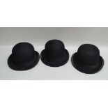 THREE BLACK BOWLER HATS; by G.W. King, Edinburgh (size 51), Doggarts (55) and Harry Hall (54) with