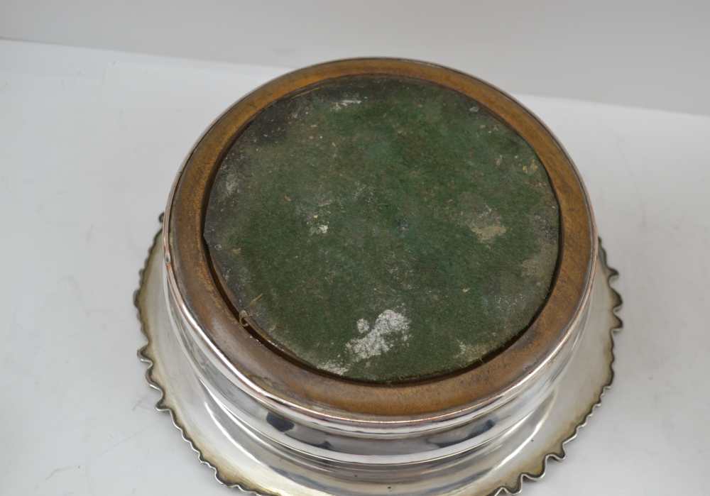 A PAIR OF SILVER PLATED BOTTLE COASTERS, Sheffield c1820, on turned wood bases, 16cm in diameter - Image 4 of 4