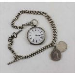 A LATE VICTORIAN SILVER CASED POCKET WATCH, chased decoration, white enamel dial, and a silver watch