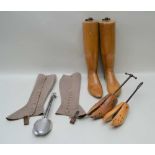 A PAIR OF ADJUSTABLE WOODEN BOOT TREES, two wooden adjustable shoe stretchers, one aluminium pair