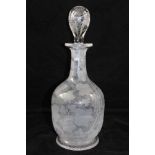 A VICTORIAN WINE DECANTER with allover fruiting vine engraving, and matching engraved stopper