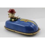 A "CODEG" TIN PLATE CLOCKWORK DODGEM CAR with driver, 24cm long