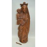 A CARVED OAK MADONNA AND CHILD, in the European Gothic taste, 70cm high