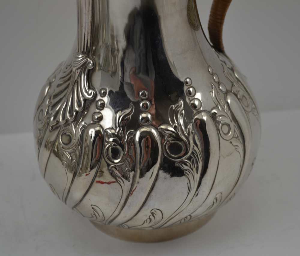 EMICK ROMER A GEORGE II SILVER JUG, London 1759, with chased and repousse decoration and fine - Image 3 of 5