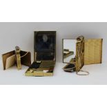 THREE MID 20TH CENTURY BRASS COMBINATION LADY'S COMPACTS, with areas for powder, cigarettes,