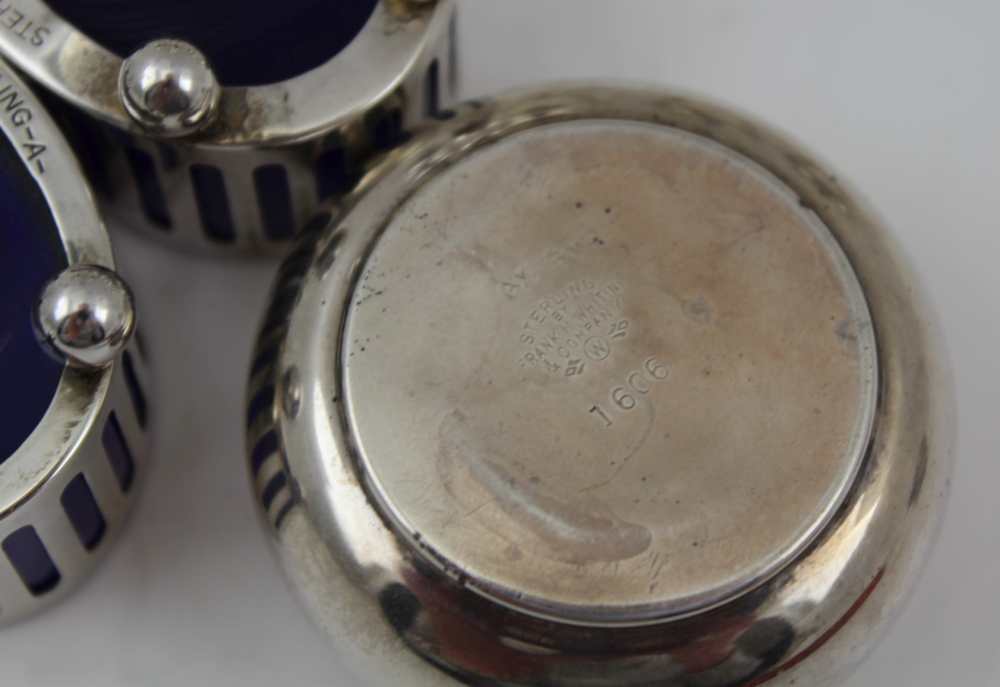 A COLLECTION OF SILVER CONDIMENTS comprising; a pair of oval sterling salts with blue glass - Image 4 of 6