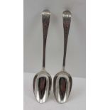 DUNCAN URQUHART & NAPHTALI HART A PAIR OF GEORGE III SERVING SPOONS, bright cut decoration, London