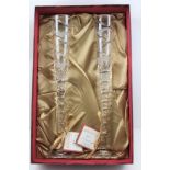 A PAIR OF ROYAL BRIERLEY CRYSTAL GLASS CHAMPAGNE FLUTES, limited edition for the millenium, No.