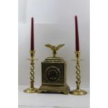 A LATE VICTORIAN CAST BRASS MANTEL CLOCK WITH EAGLE MOUNT, fitted 8-day French movement, 30cm