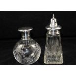 HENRY PERKINS & SONS A SILVER LIDDED CUT GLASS SUGAR SHAKER, London 1929, 15cm high, together with a