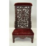 A LATE 19TH CENTURY CARVED OAK BLACK FOREST PRIE-DIEU CHAIR, having carved vine decoration, with