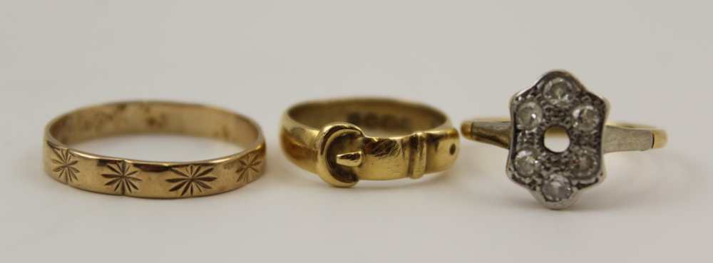 A SELECTION OF FIVE RINGS comprising; an 18ct gold buckle form ring, together with; a 9ct gold - Image 2 of 3