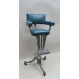 A CIRCA 1930s CAST ALUMINIUM FRAMED CHILD SIZED BARBER'S CHAIR, having adjustable foot plate, and