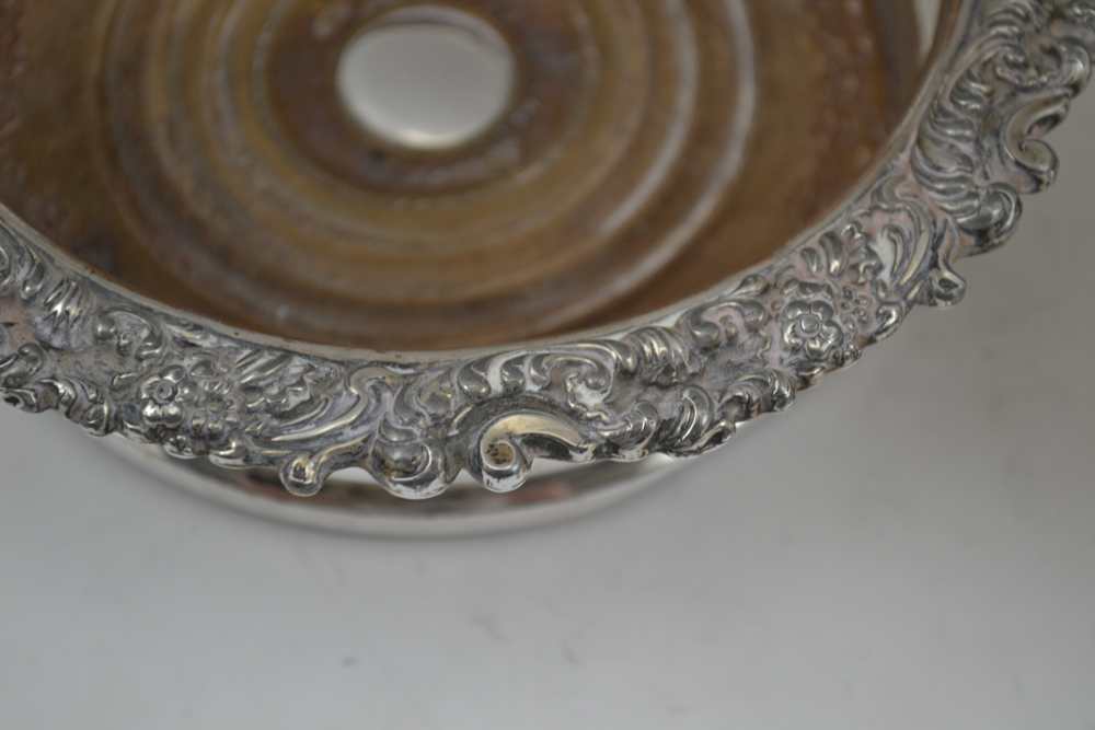 A PAIR OF SILVER PLATED BOTTLE COASTERS, Sheffield c1820, on turned wood bases, 16cm in diameter - Image 2 of 4