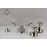 A PAIR OF STERLING SILVER DWARF CANDLESTICKS on circular platform bases, a STERLING SILVER BUD VASE,