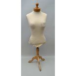 A FEMALE FORM MANNEQUIN DRESSMAKER'S DUMMY