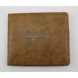 AN AUTOGRAPH ALBUM OF CRICKET INTEREST, pages of teams including West Indies 1957, Australians 1956,