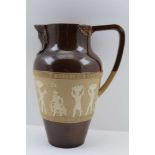 A DOULTON LAMBETH STONEWARE JUG of baluster form, part brown glazed, banded with hyraglyphs in the
