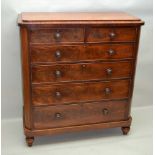 A LARGE 19TH CENTURY MAHOGANY CHEST OF DRAWERS, having stepped top, two inline and four graduating