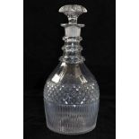 A GEORGE III DECANTER having triple ringed neck, hobnail cut band, facet cut panels on the