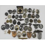 A BOXED GERMAN MILITARY IRON CROSS FIRST CLASS with pin back, together with a large selection of