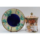 A 19TH CENTURY MAJOLICA PLATE, impressed basket weave edge with dog roses, about a cobalt blue sole,