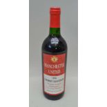 A COLLECTOR'S BOTTLE OF MANCHESTER UNITED OFFICIAL CLUB WINE "Premier League Champions. F.A. Cup