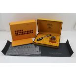 A "DELTA COLOSSEUM" FOUNTAIN PEN with a bottle of yellow ink, in presentation box with paperwork,
